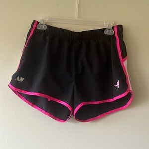Women’s new balance black and hot pink running shorts with liner. Size Medium